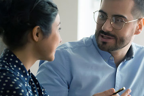 image of two people during a business meeting