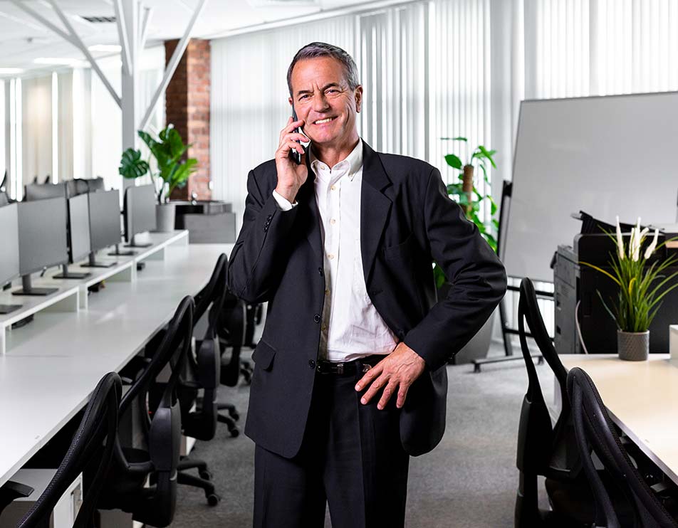 image of a business man using a mobile phone